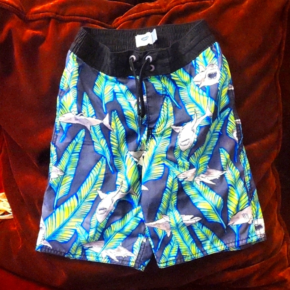 Boys Swim trunks, Old Navy size 8 (M). Black & green shark/leaf design. Like new